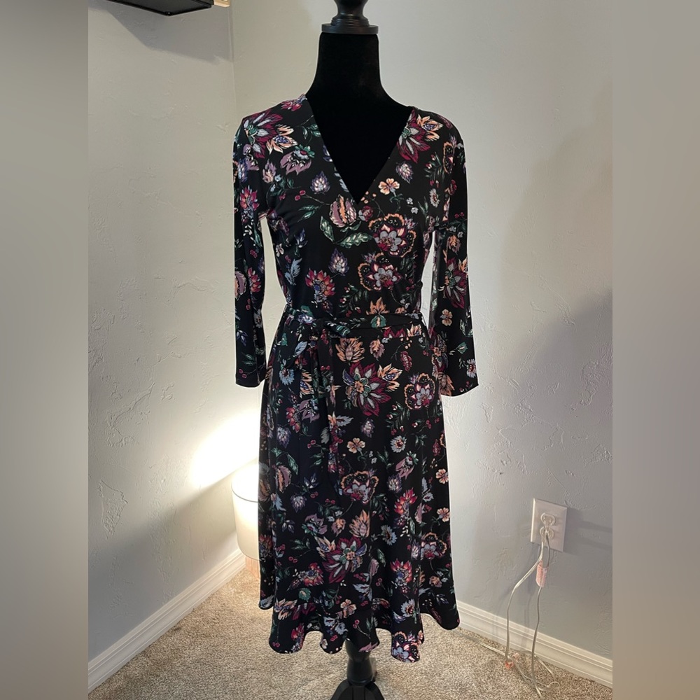 Nice black long sleeved dress. Could be formal or casual very comfortable style